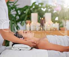 Restoring complete balance to mind and body. an attractive young woman enjoying a beauty treatment at a spa.