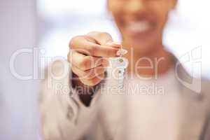 Real estate, realtor and house key in hand for homeowner as mortgage investment, finance loan and future home security. Closeup of broker woman, insurance worker and estate manager in new property