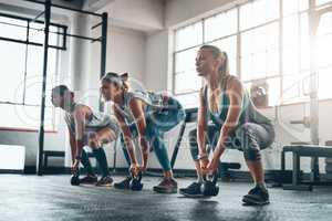 Keep going with your fitness goals. three young women working out together.