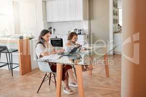 Entrepreneur or small business owner working on laptop while daughter doing drawing at home. Startup worker typing, reading and send email on computer while working online and girl playing alone