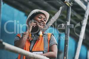 Construction manager, contractor and engineer talking on a phone while planning logistics at a building site in town. Happy, smiling and cheerful young female architect, supervisor and city planner