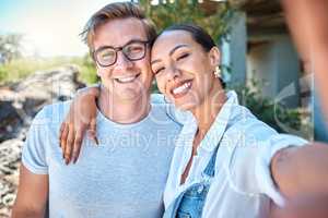 Selfie of interracial couple in love, smile and romantic date with care, bond and relax in summer outside. Portrait of happy boyfriend and girlfriend on holiday with special vacation photo together