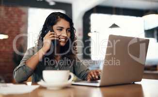 Freelance, entrepreneur or small business owner talking, networking and plans on a phone call while reading emails on a laptop. Female remote worker in a cafe or coffee shop with wireless technology