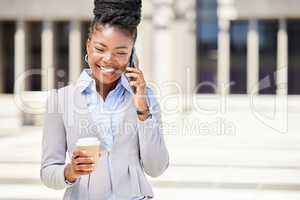 Happy business woman on a phone call and drinking coffee while outside in the city, happy and confident. Young entrepreneur planning with investors, discussing strategy and innovative idea