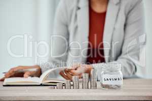 Accounting business woman counting her personal savings at home, planning budget to pay bills for the month. Finance savvy and professional female writing in a financial diary for investment funds