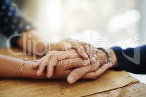 Be the person who helps the next. Closeup shot of two unrecognizable people holding hands in comfort.