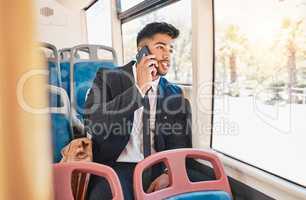 Phone, travel or communication with a business man talking and networking on a bus, public transport and commuting in a city. 5g mobile technology with a young worker having a conversation on a call