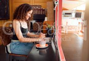 Coffee shop owner, cafe manager or startup company woman on her laptop working, planning and organizing project ideas for website. Happy, smiling and excited business freelancer doing SEO research