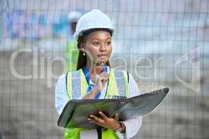 Construction worker, maintenance and development woman thinking with documents at work. Building management employee with a vision for improvement or plan for contractor or builder at the job site.