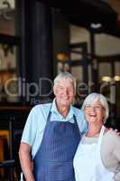 Forget retirement, its time to feed our passion. Portrait of a senior couple running a small business together.
