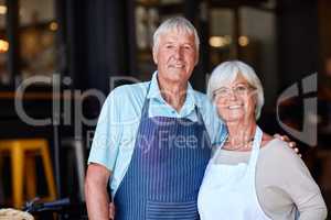 Taking on the challenge of starting a small business. Portrait of a senior couple running a small business together.