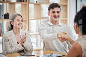 Happy business people shaking hands, meeting and greeting in an office. Happy professional talking to his boss about a promotion or job. Hr congratulating ambitious employee, clapping and celebrating