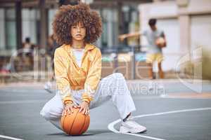 Cool basketball player with funky, confident and hipster attitude ready for game, fun or playing on outdoor sports court. Portrait of young, fashion and beauty black woman with afro ready for fitness