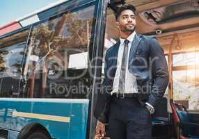 Corporate businessman travel in a city on a bus to work in a suit thinking of goals and professional career. Confident, young and Indian worker or startup entrepreneur on daily urban commute