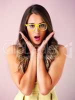 No ways. a beautiful young woman looking surprised against a pink background.