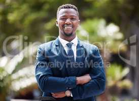 Success, happy and business mindset of a corporate executive man standing outdoors. Portrait of a successful businessman with leadership vision and a smile confident and proud about professional life